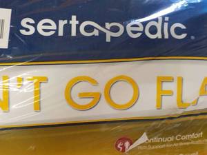 lot 206 image: Serta Wont Go Flat pillow...