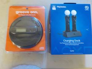 lot 289 image: Playstation charging dock and groov...
