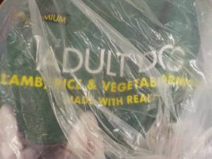 lot 299 image: Kirkland 40 lb. open bag adult dog ...