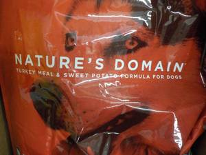 lot 302 image: Natures Domain 35 lb. bag dog food...