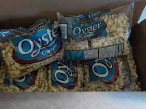 lot 323 image: 2 cases of 12 bags Oster crackers -...