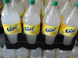lot 331 image: 8 2 liter bottle Fanta Pina Colada ...