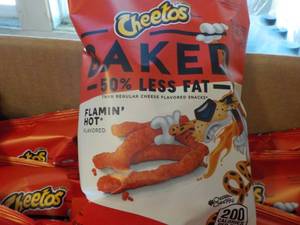 lot 376 image: 3 cases Cheetos Flamin Hot snacks...