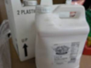 lot 392 image: 2 17.5 lb. jugs Gold-N-Sweet liquid...