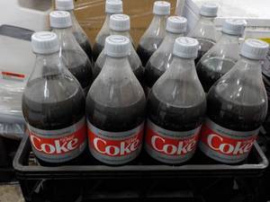 lot 438 image: 12 1.25 liter bottles Diet Coke...