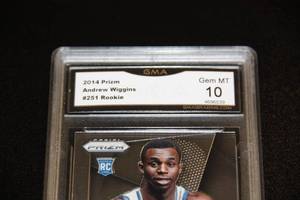 lot 8 image: 2014 Prizm Andrew Wiggins Rookie Card GMA 10
