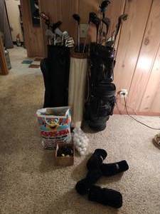 Sets of Golf Clubs with balls