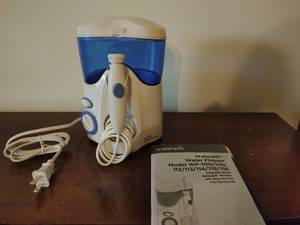 Waterpik Water Flosser and scale