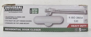 lot 530 image: Universal Hardware Heavy-Duty Ivory Residential Door Closer