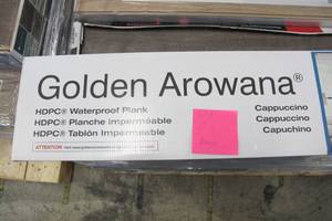 lot 513 image: Golden Arowana Cappucino 13 Boxes HDPC Waterproof Plank Flooring (200 Square Feet - 91 Planks)