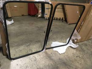 lot 45 image: Lot of 2 Umbra Hub 36 in. H x 24 in. W Contemporary Modern Rectangle Framed Black Mirror not used see pictures