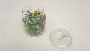 lot 10 image: Glass Jar Filled With Colorful Marbles