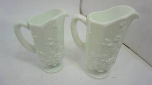 lot 50 image: Westmore Land Milk Glass Paneled Grape Pitchers