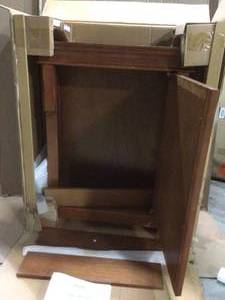Naples 26-34 in. W Bathroom Storage Wall Cabinet in Warm Cinnamon Customer Returns See Pictures