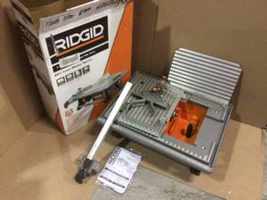 6.5 Amp Corded 7 in. Table Top Wet Tile Saw by RIDGID Customer Returns See Pictures
