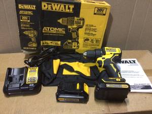 ATOMIC 20-Volt MAX Cordless Brushless Compact 12 in. DrillDriver, (2) 20-Volt 1.3Ah Batteries, Charger &amp Bag by DEWALT Customer Returns See Pictures