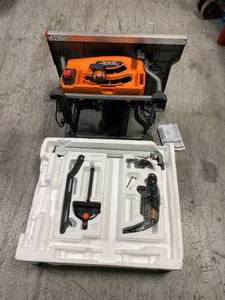 15 Amp 10 in. Table Saw with Folding Stand by RIDGID Customer Returns See Pictures