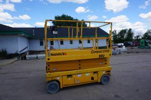 lot 14 image: 2013 Haulotte Model Compact 2747E Scissors Lift