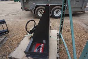 lot 25 image: Brand New Grey Wolf Brand Universal Mount Bobcat Skid Loader Skid Steer Hydraulic TreePost Pulling Attachment