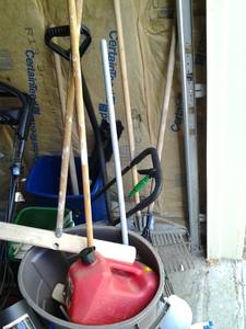 Corner Lot of Shovels, Brooms, Rake...