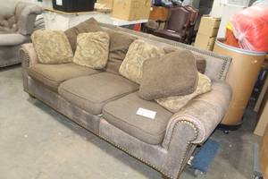 lot 34 image: Leather Wood Living Room Couch  with Upholstered Seat Cushions and a Set of 8 Throw Pillows