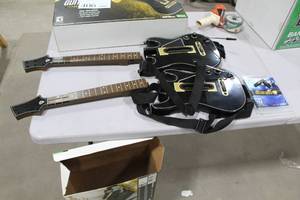 lot 405 image: Lot of (2) Xbox One Guitar Hero Live Supreme Party Edition  - Game, Guitar Controllers (x2), USB wireless connections (x2)
