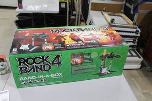 lot 407 image: Xbox One Rockband 4 (in box)