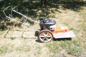 lot 12 image: Walk behind string trimmer