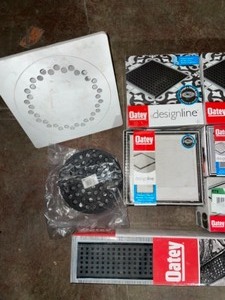 lot 22 image: Assorted Oatey Designline Shower Drains. Various Sizes & Colors. See Pictures