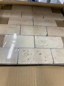 lot 22 image: TUMBLED CHIARO BRICK MOSAIC TILE