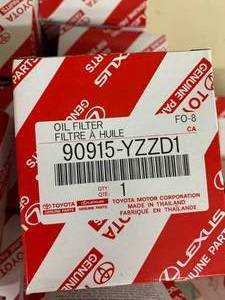 lot 306 image: TOYOTALEXUS GENUINE OIL FILTER