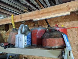 Lot of Steel Gas Cans and More on Shelf - Shelf NOT Included