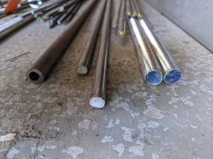 Lot of (2) 34 x 12 long Stainless Steel Threaded Rod, (2) 12 x 12 Stainless Steel Rod, (13) 38 x 12 Stainless Steel Rods