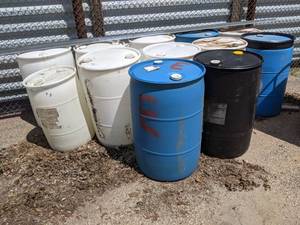 Lot of (4) 55 gallon Plastic Drums - Choice from Pile