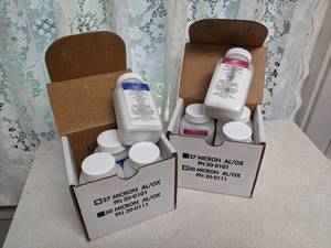lot 327 image: (8) Jars of Blasting Media - 27 & 50 Micron