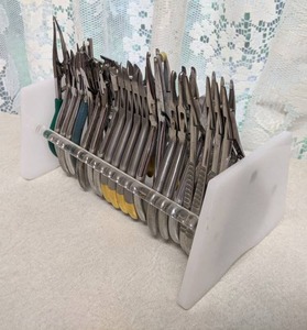 lot 340 image: Rack with 22 Orthodontic Tools