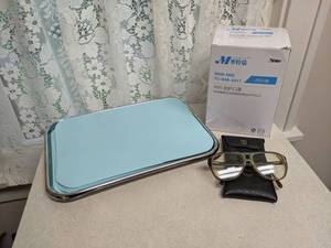 lot 378 image: (2) 14 x 10 Stainless Steel Trays, Liners and Partial Box of N95 Masks (Looks like only a few have been taken)