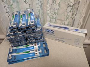lot 382 image: (34) Listerine UltraClean Flossers and (24) Oral-B Interdental Handle  Clips