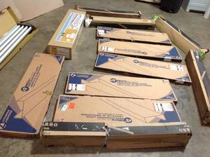 lot 28 image: pallet of assorted 4 ft. Wide Body Acrylic Diffusers and lighting see all pictures