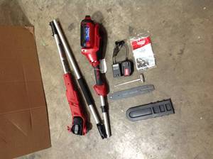 10 in. 60-Volt Lithium Ion Cordless Electric Pole Saw - Battery and Charger Included by Toro (new) see all pictures