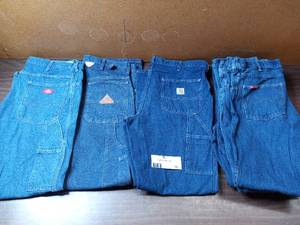 7 Pairs of Carpenter Jeans (1) 34 x 32 Dickies, (1) 34 x 32 Carhartt, (1) 34 x 32 Fire Resistant Bullwark, (3) 34 x 32 G& K (1) 34 x 33 G & K