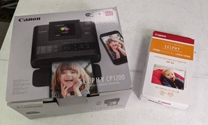 lot 189 image: Canon SELPHY CP1200 Wireless Compact Photo Printer with RP-54 Postcard-Size Paper & Ink Kit (NIB)