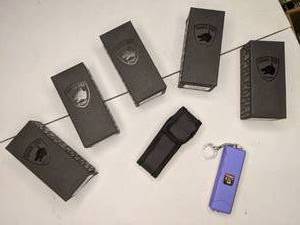 lot 259 image: Set of (5) Guard Dog Security Hornet Worlds Smallest Stun Gun Keychain with Mini LED Flashlight. Lot 33. 