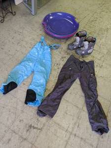 lot 249 image: Family Fun Lot of (2) Snow Ski Pants, (3) Sleds, (1) Womens Snowboard Boots Columbia and Burton