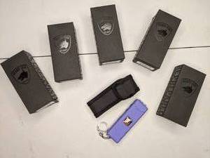 lot 258 image: Set of (5) Guard Dog Security Hornet Worlds Smallest Stun Gun Keychain with Mini LED Flashlight. Lot 23. 