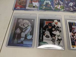 lot 64 image: Football and Hockey Card Collection Wayne Gretzky Peyton Manning Jerry Rice