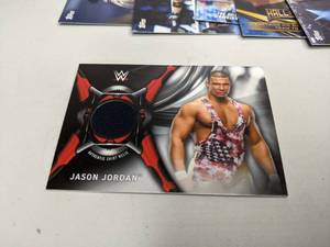 lot 62 image: WWE Wrestle Mania Card Collection Lesnar Reigns Flair Shirt Relic