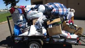 lot 47 image: Trailer Full Of Mixed Clothes (All sizes)