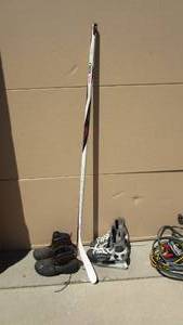 lot 16 image: CCM Ice  Skates Size 9, New Sherwood Stick. Pair Of boots Size 11