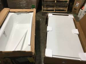 lot 30 image: Nextile 4 piece Tub Wall Set and Bootz Maui enamel Bathtub see pictures